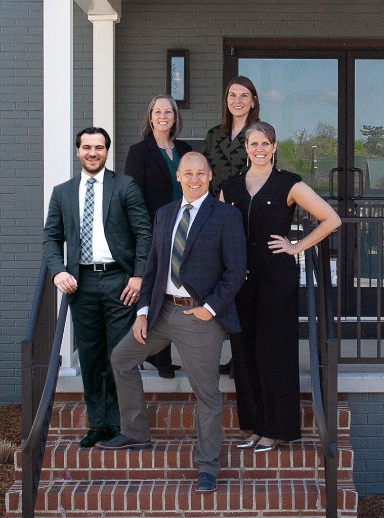 The Being Financial Advisor Team, Jared Troutman, Nathan Leo, Mandy Leeth, Kassi Redifer, Marcy Holbert in front of their office at 328 S Main St in Harrisonburg Virginia